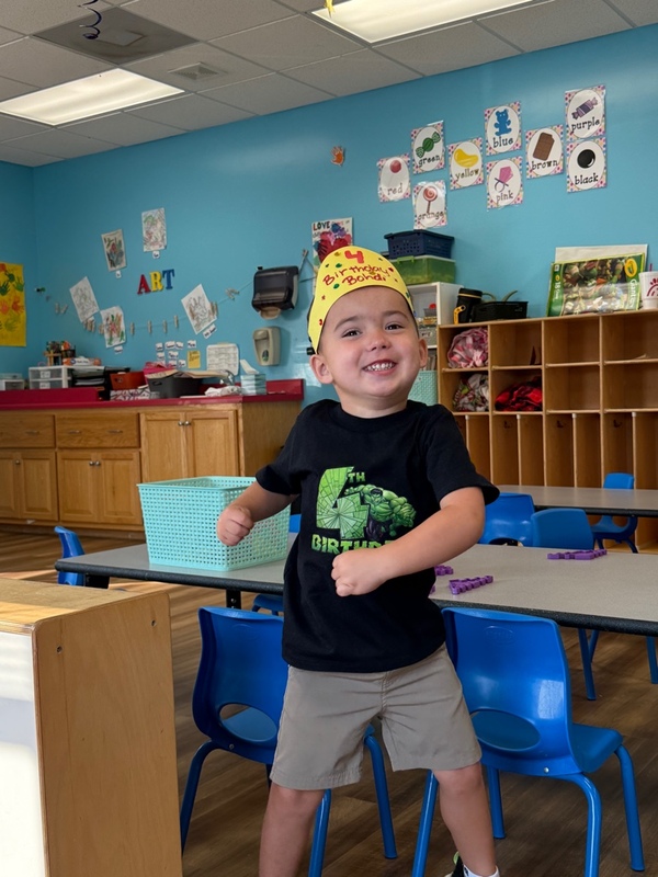 Smarr boy wearing birthday crown