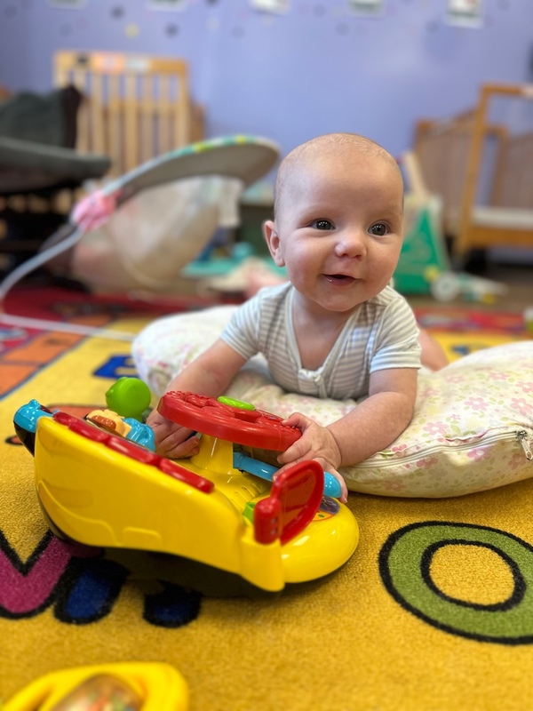 Smarr baby playing with toy